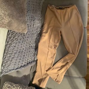 Exposed seam, split hem, cropped pants